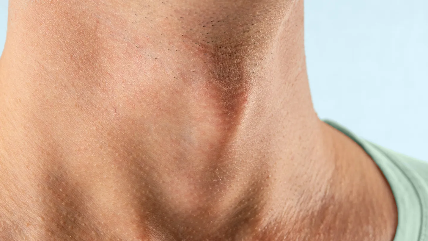 close-up of man's adam's apple