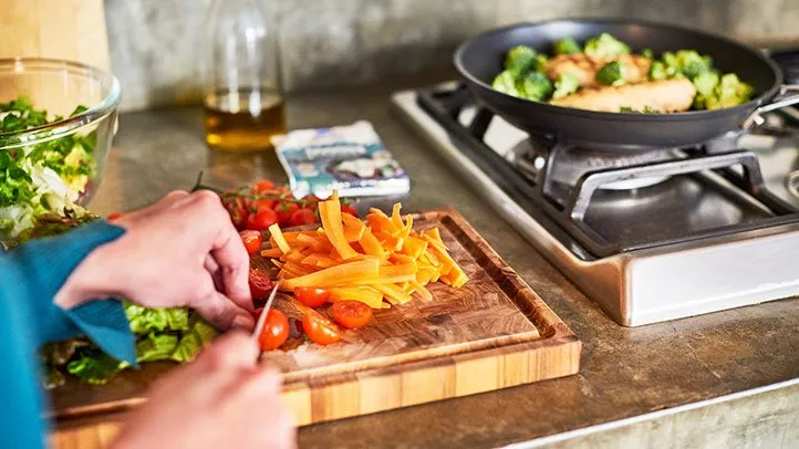 a person preparing vegetables
