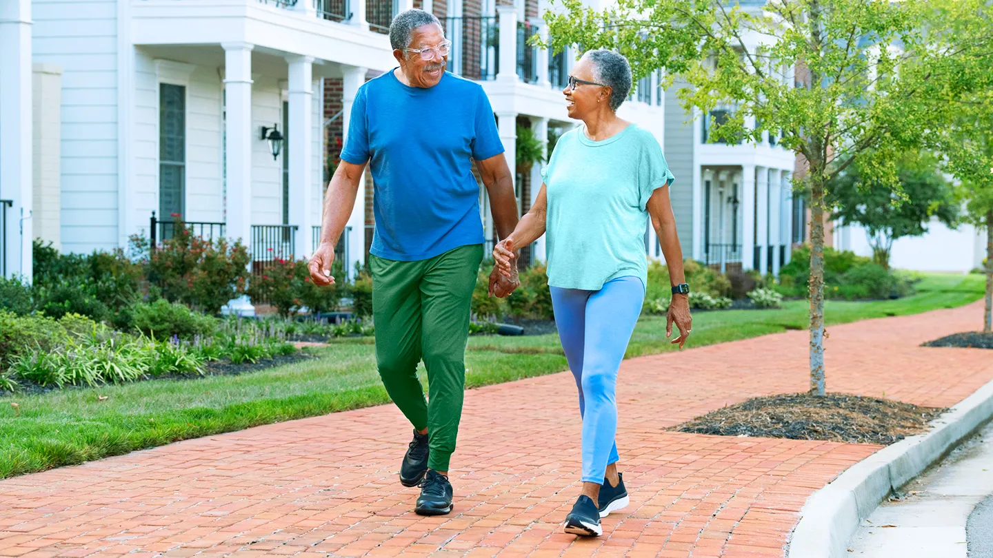 couple walking strolling around neighborhood after meal